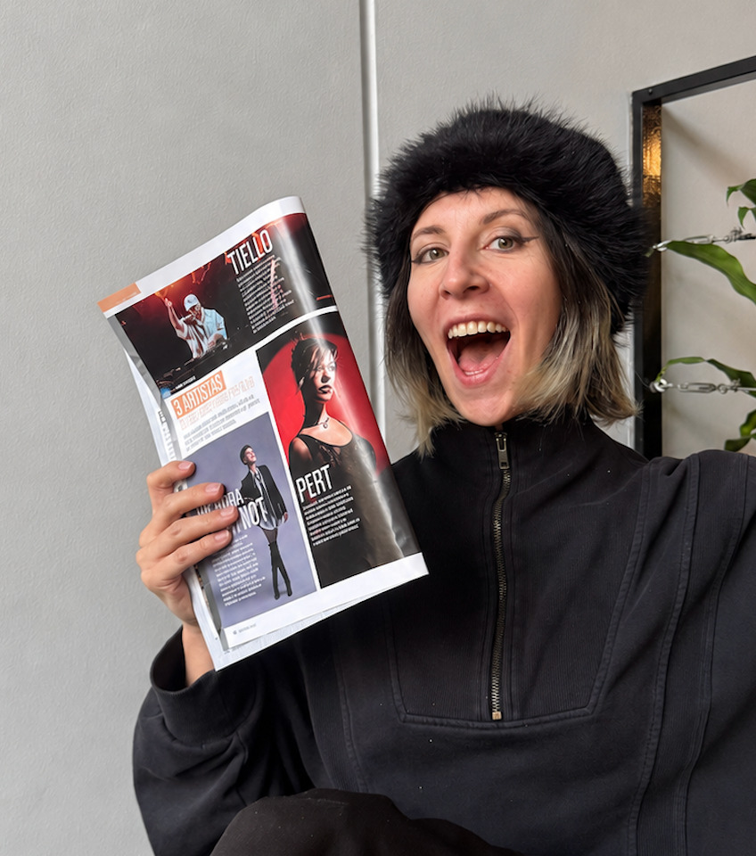 PERT holding the DJ Mag Latam magazine